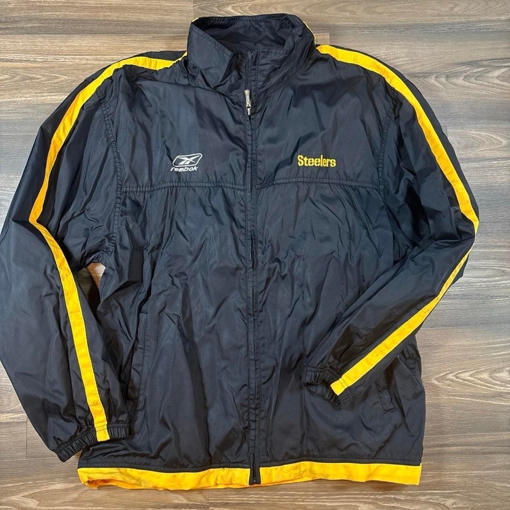 Reebok Pittsburgh Steelers NFL windbreaker jacket with yellow stripes on sleeves